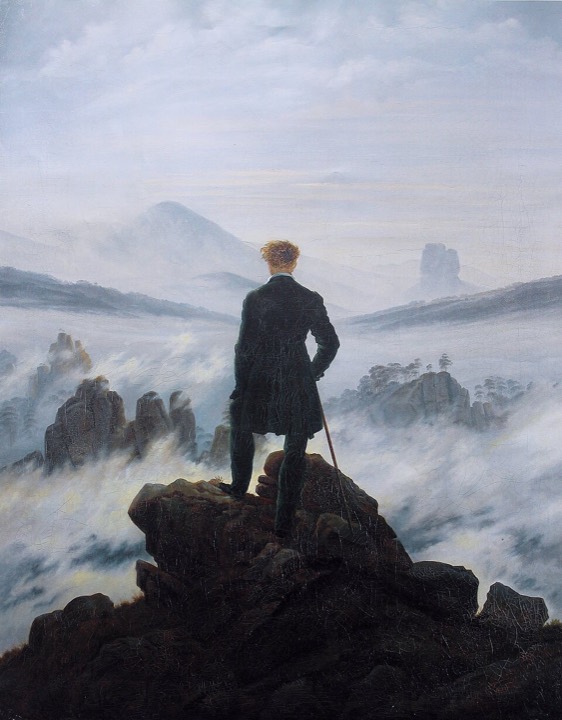 Caspar David Friedrich's Wanderer Above the Sea of Fog: a man seen from behind on a rocky peak above a sea of fog